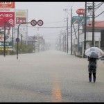 Jalan yang tergenang air akibat hujan deras terlihat di Takeo, Prefektur Saga, Jepang, Sabtu (14/8/2021), foto ini diambil oleh Kyodo.-1688974168