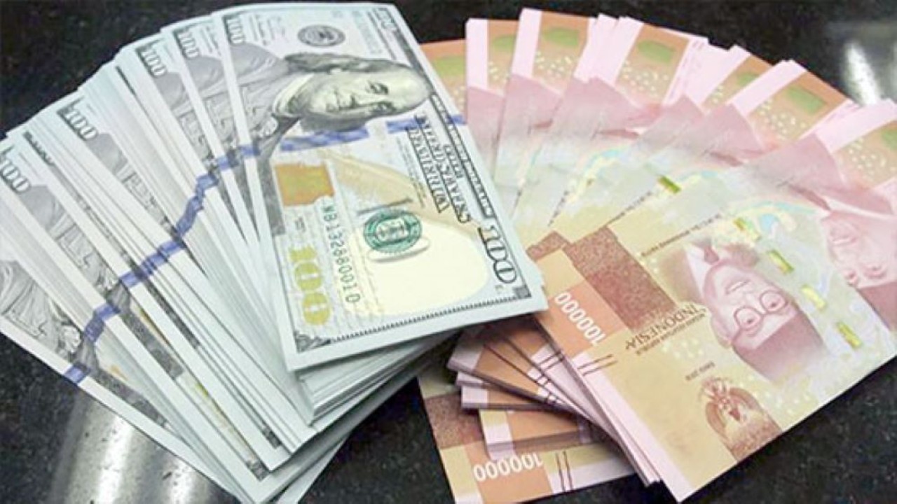 Mata uang Rupiah dan Dolar AS/ist